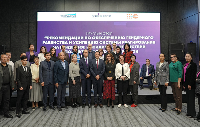 group of people -participants of the meeting are standing