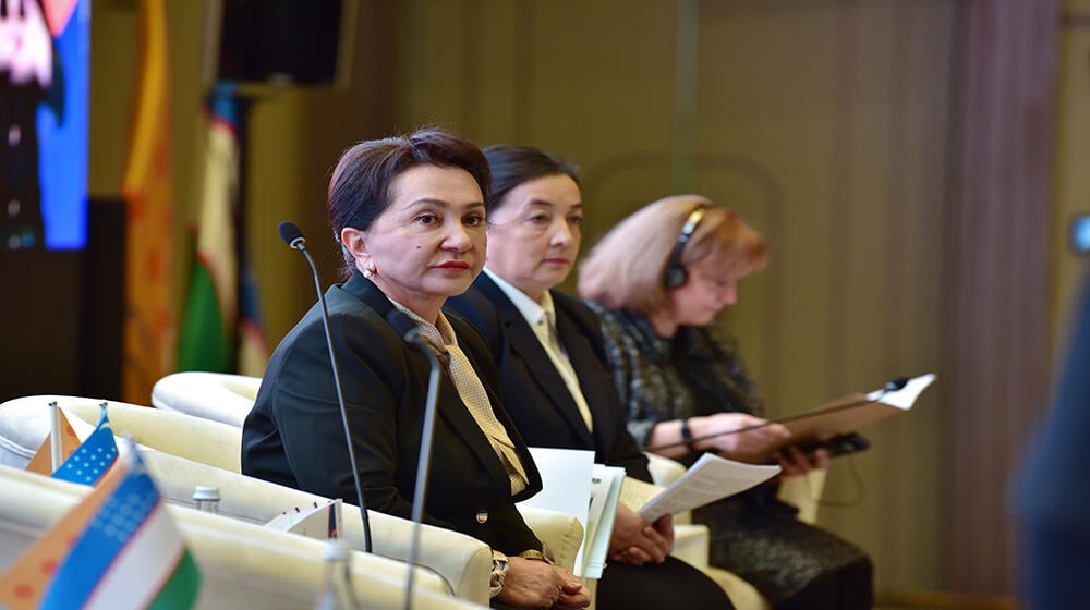 panelists of the conference are sitting on chairs