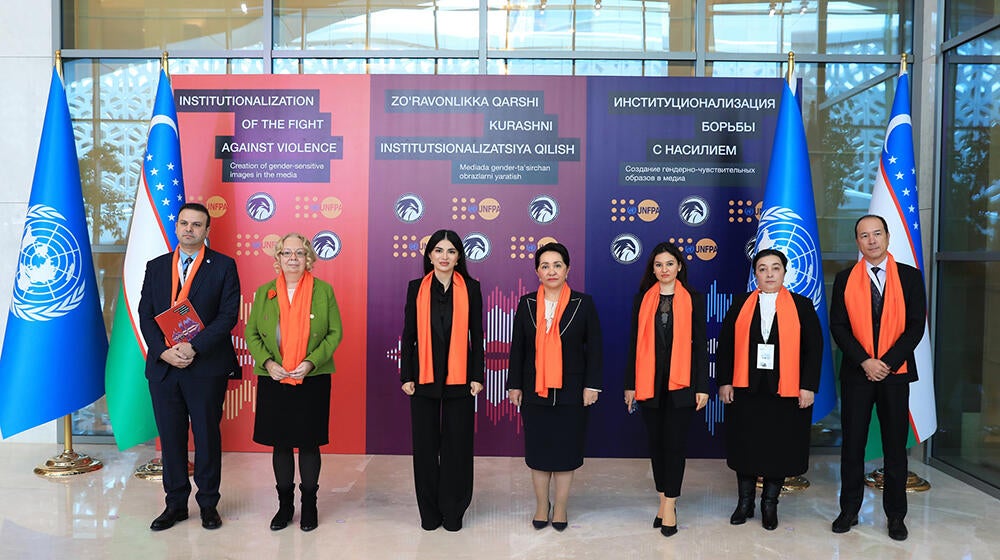 group of people -participants of the meeting are standing